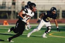 Desert Oasis wide receiver Anthony Sarracino (1) carries the ball during a high school football ...