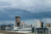 Storm clouds gather over the skyline on Thursday, Aug. 13, 2026, near downtown Las Vegas. (Liv ...