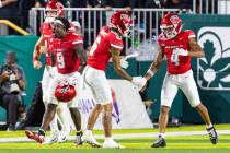 UNLV running back Jai’Den Thomas (9) celebrates after scoring the third touchdown during ...