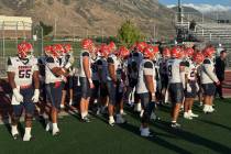 The Bishop Gorman football team prepares to face Lone Peak (Utah) on Friday. (Alex Wright/Revie ...