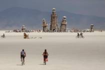 The Black Rock Lighthouse Service installation is shown in the distance during Burning Man at t ...