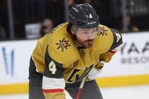 Golden Knights defenseman Rasmus Andersson (4) looks on during a break in the second period of ...