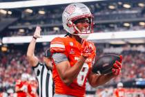 Rebels wide receiver Taeshaun Lyons (8) celebrates a catch during an NCAA football game against ...