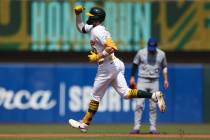 Athletics' Henry Bolte jogs around the bases after hitting a solo home run during the thir ...