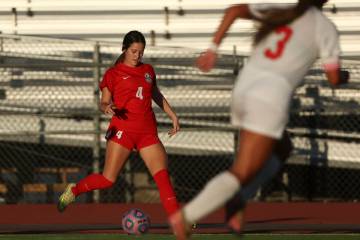 Coronado's Ella Schultz (4) kicks the ball during a high school soccer game at Coronado Hi ...