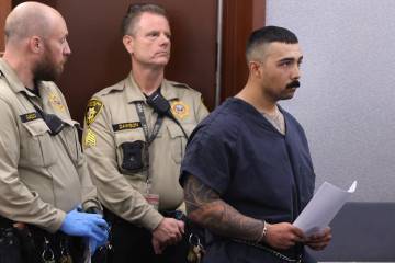 Antonio Chavez, a Las Vegas police officer charged with theft, burglary, and perjury, appears i ...