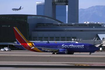 A Southwest Airlines jet taxis at Harry Reid International Airport Thursday, July 30, 2026, in ...