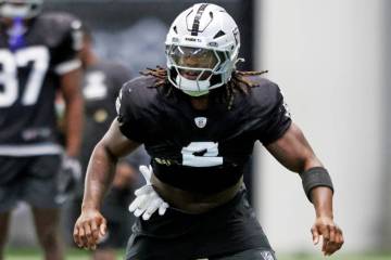 Raiders running back Ashton Jeanty (2) warms up during a team practice at their training facili ...