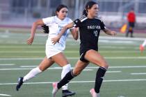 Palo Verde's forward Caitlynn Nick (10) drives past Canyon Springs' defense, Nayeli C ...