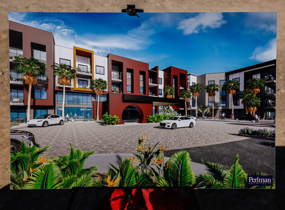 Rendering of the Jewel apartment community in Las Vegas Chinatown showing multi-story buildings with red and cream exteriors, palm trees and a front motor court