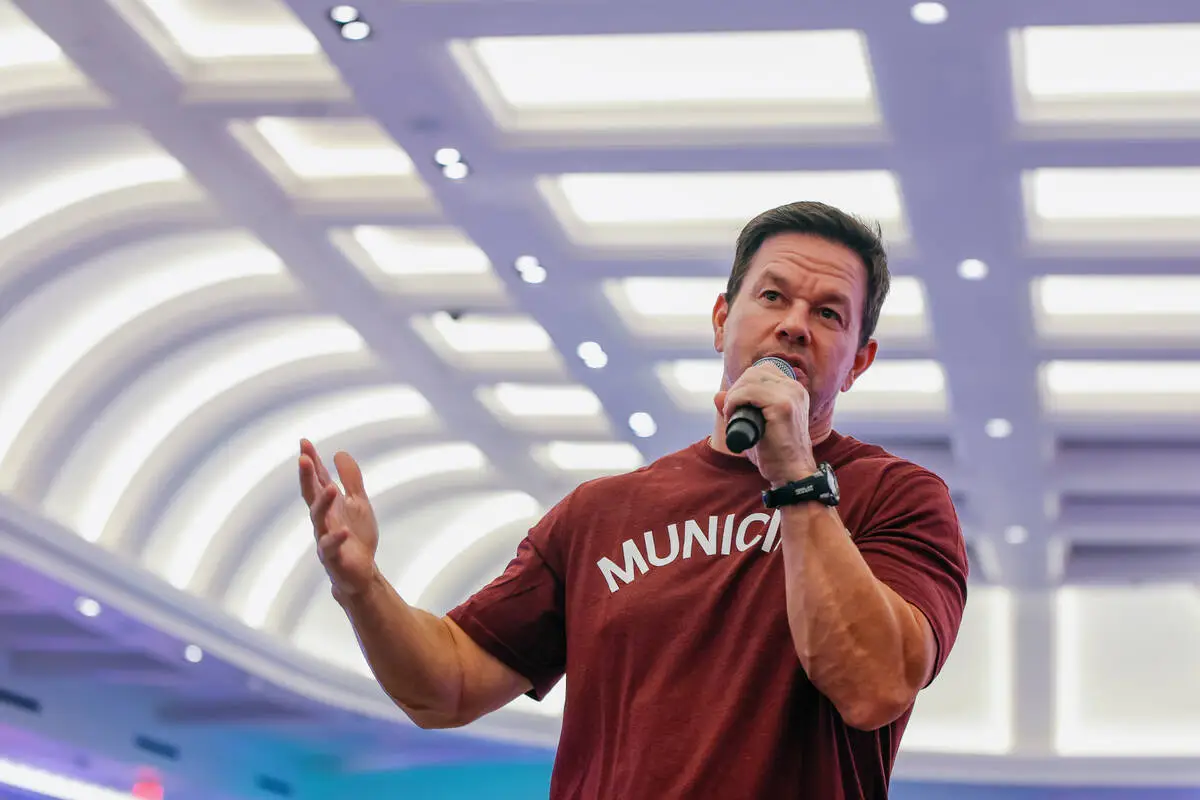 Mark Wahlberg speaks into a microphone to the crowd at the Suncoast remodel celebration in Summerlin on Sept. 29, 2026