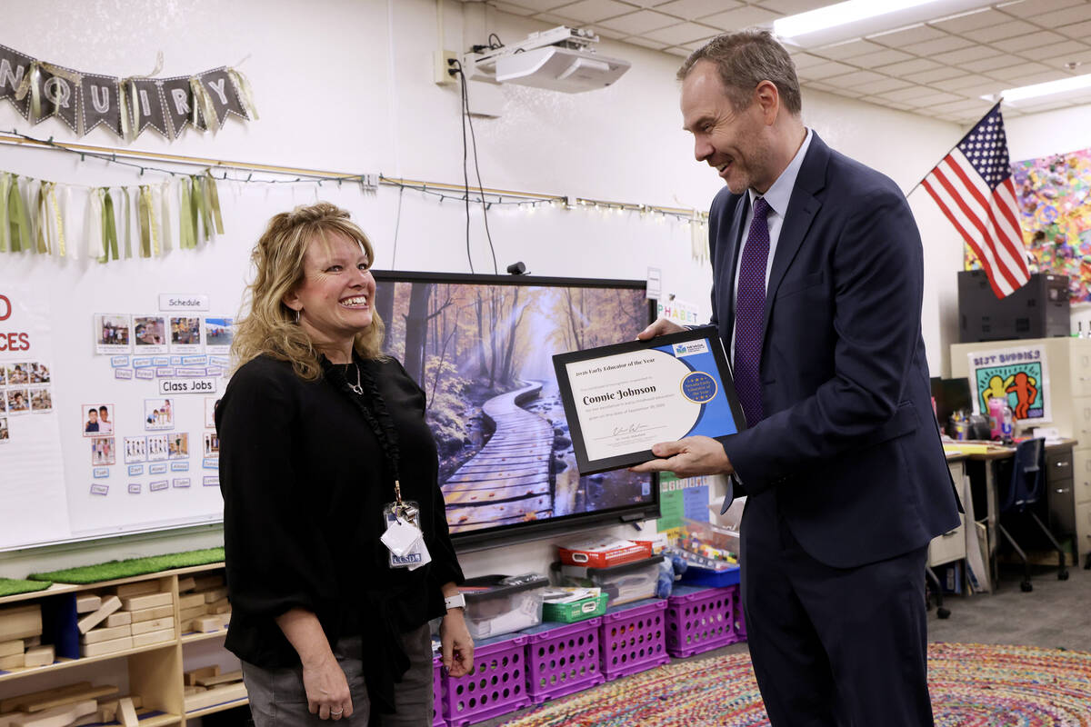 Connie Johnson, a preschool teacher at Piggott Academy of International Studies, reacts to receiving the 2026 Nevada Early Educator of the Year award in her Las Vegas classroom on Sept. 28, 2026