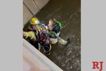Clark County fire crews conducted a water rescue Monday night to save a man who was in fast-mov ...