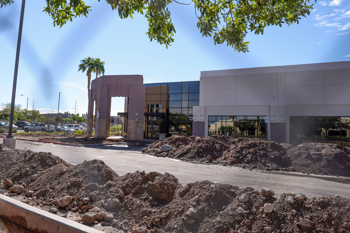 Piles of excavated dirt on the construction site where Henderson office buildings are being converted into The Cliff