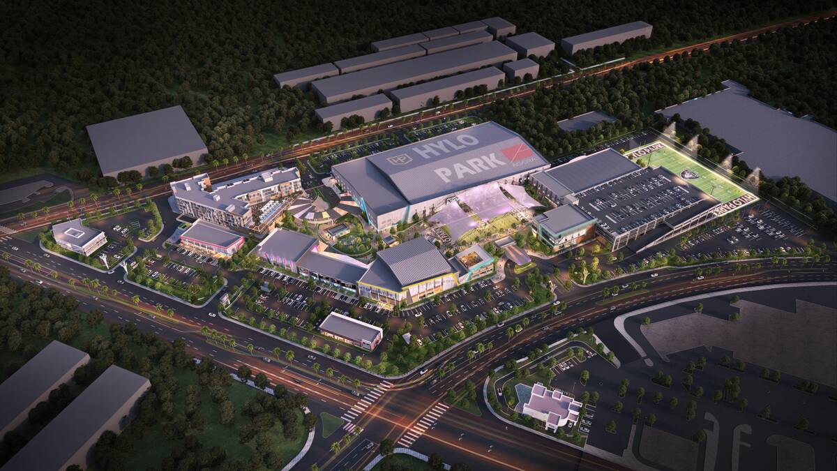 Aerial rendering of the planned Hylo Park sports campus on the former Fiesta Rancho site at Rancho Drive and Lake Mead Boulevard in North Las Vegas, with a large Hylo Park sports building, hotel and turf field