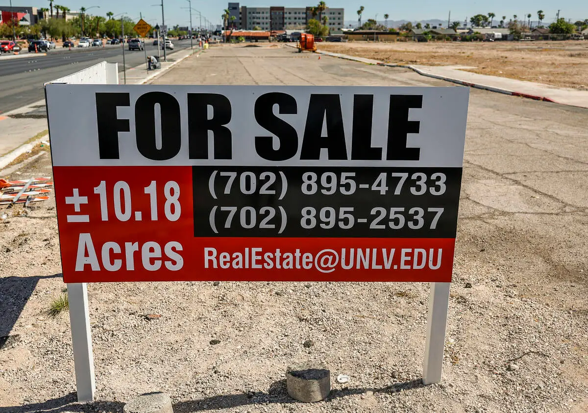 For sale sign listing plus or minus 10.18 acres on the vacant UNLV lot at 851 E. Tropicana Ave. in Las Vegas