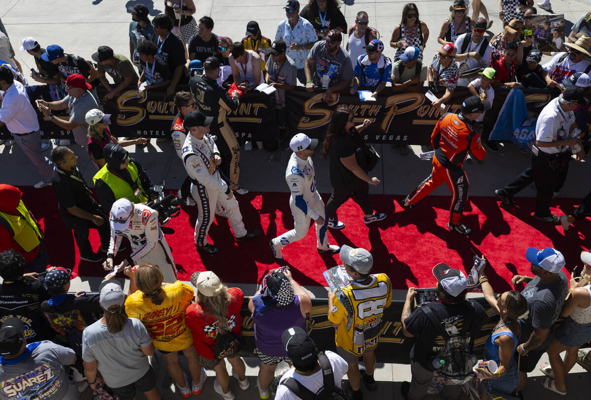 Drivers leave the drivers meeting before start of the South Point 400 NASCAR Cup Series auto ra ...