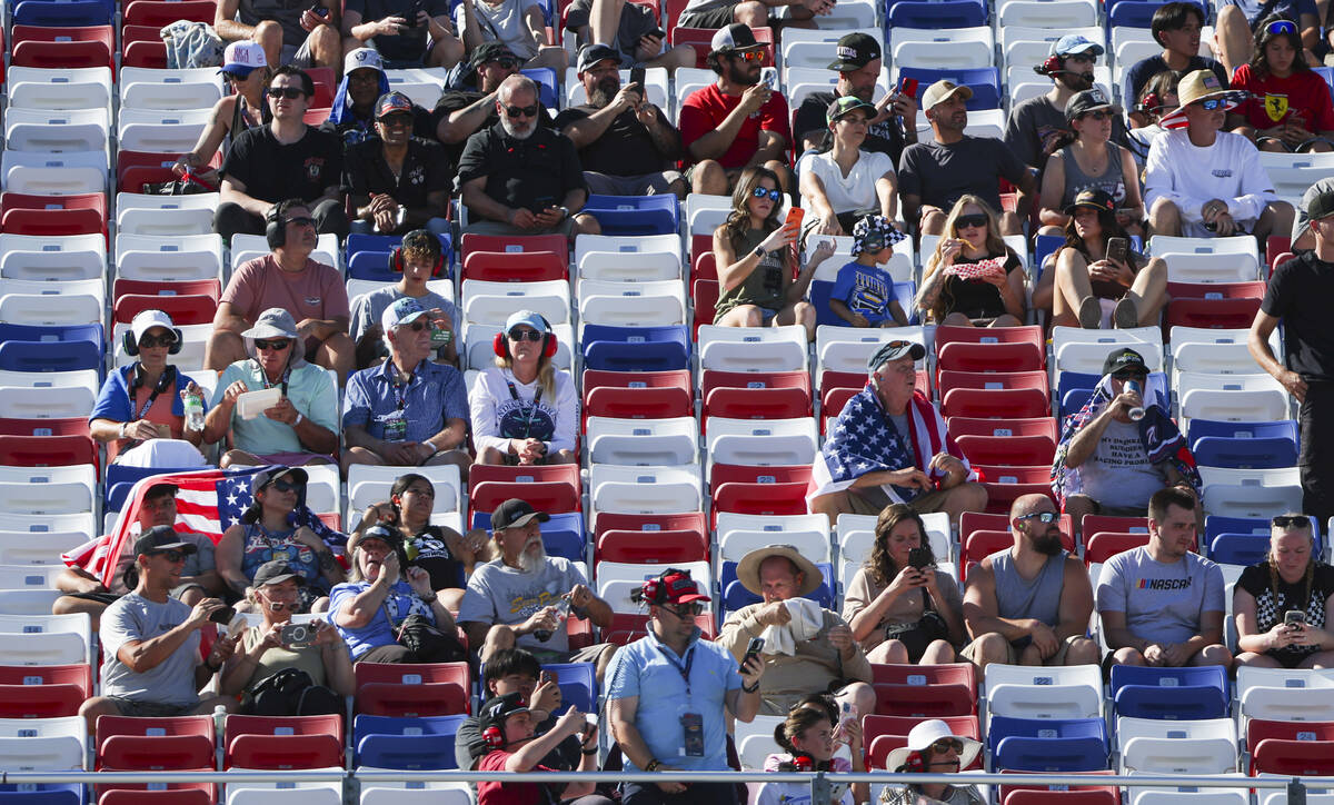 Fans wait for the start of the South Point 400 NASCAR Cup Series auto race at Las Vegas Motor S ...