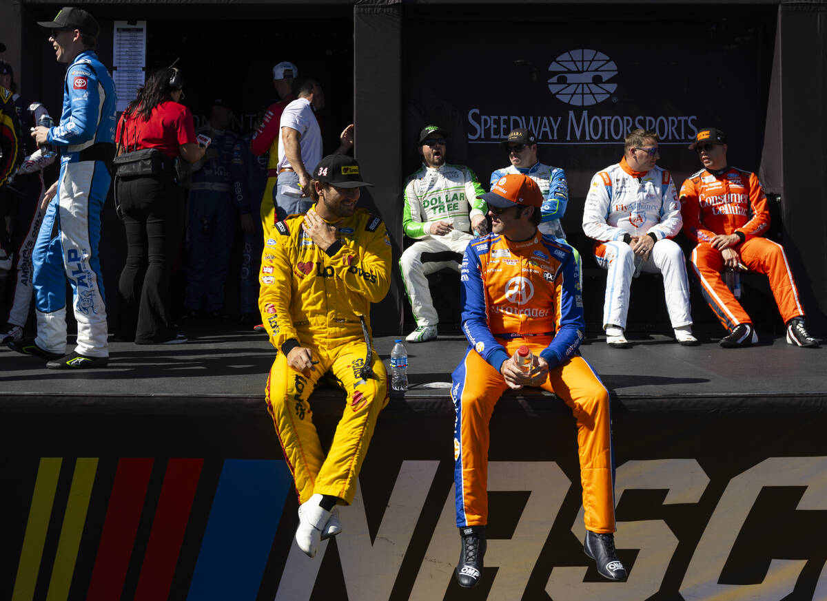 Driver Todd Gilliland (34) talks with Austin Cindric (2) before introductions for the South Poi ...