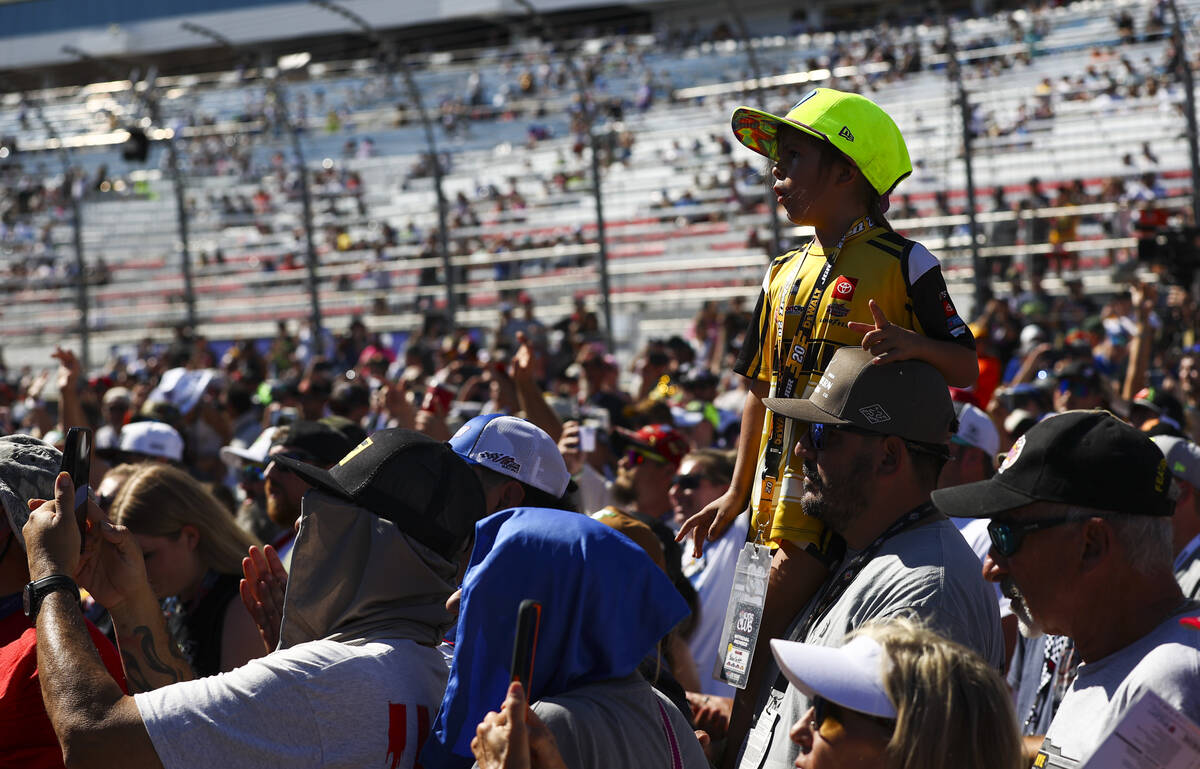 Fans cheer during driver introductions for the South Point 400 NASCAR Cup Series auto race at L ...