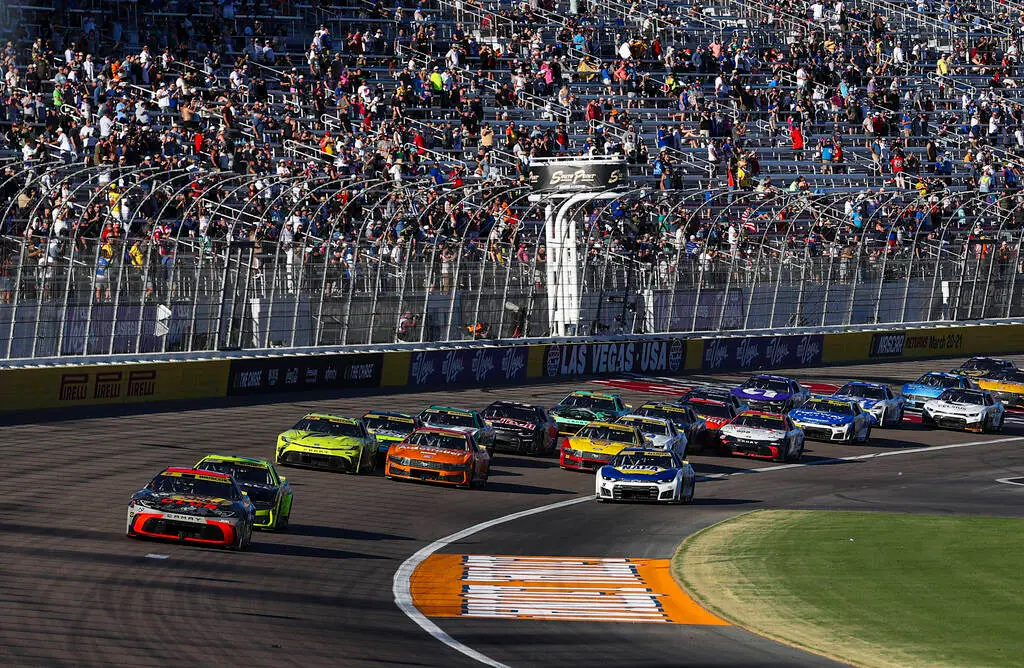 Drver Chase Briscoe (19) leads the race as drivers come out of a caution during the South Point ...